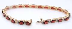 Wonderful Yellow Gold oval Garnet and Diamond Bracelet