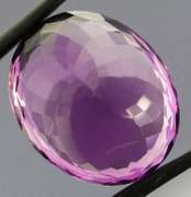 Substantial oval cut 21.43ct violet Amethyst