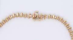 Gorgeous Yellow Gold Diamond S Tennis Bracelet