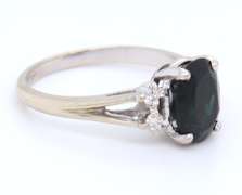 Handsome White Gold oval Blue Sapphire and Diamond Ring