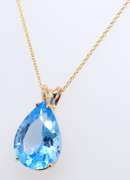 Gorgeous Yellow Gold Pear Shaped Blue Topaz Pendant on Chain