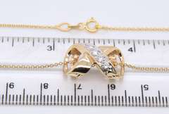 Attractive Yellow gold Diamond X Slider Pendant on Chain