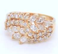 Handsome Marquoise and Round Cut Diamond Cluster Ring