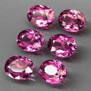 Remarkable 8.61ct violet pink Rhodolite Garnet set