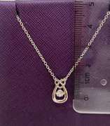 Pear shape With heart on top silver dancing pendant