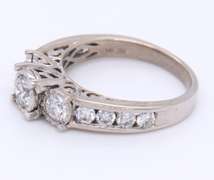 Stunning White Gold 1.25ctw 3 Diamond Ring w Channel Set Sides