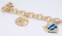 Incredible Yellow Gold Charm Bracelet with 3 Charms