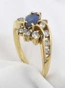 Tasteful Marquise Sapphire & Diamond Ring