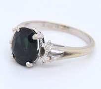 Handsome White Gold oval Blue Sapphire and Diamond Ring