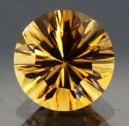 Fiery 3.06ct concave cut Citrine solitaire