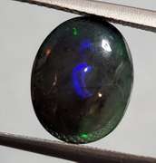 Glistening 3.61ct Welo Black Opal cabochon