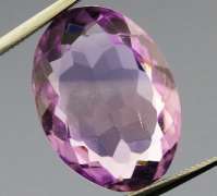 Glittering oval cut 8.35ct violet Amethyst