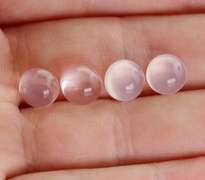 Glowing! 9.72ct powder pink Rose Quartz cabochon set