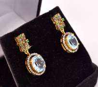 Ravishing 60.00CTW Blue Topaz, 12.00CTW Diamond & 0.75CTW Green Agate Jewelry Set in 18KT Gold Plated Sterling Silver Necklace & Earrings