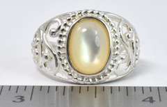Sterling Silver Ring With An Iridescent Stone