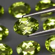 Dazzling 7.33ct untreated apple green Peridot set