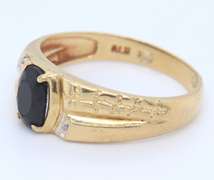Attractive Yellow Gold Black Onyx and Diamond Ring