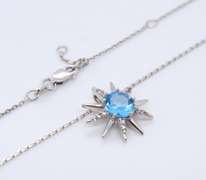 925 Sterling Silver Light Blue Cubic Zirconia Sun Pendant on Chain Necklace