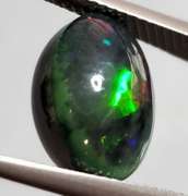Glistening 3.61ct Welo Black Opal cabochon