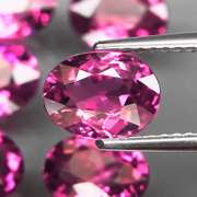 Remarkable 8.61ct violet pink Rhodolite Garnet set