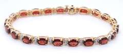 Wonderful Yellow Gold oval Garnet and Diamond Bracelet