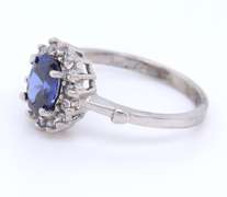 Charming White Gold Tanzanite and Diamond Halo Ring