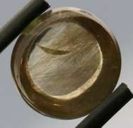 Gorgeous 4.86ct round cut Scapolite cabochon