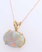 Fantastic Yellow Gold oval Opal Pendant on Chain