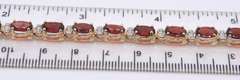 Wonderful Yellow Gold oval Garnet and Diamond Bracelet