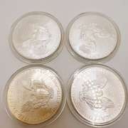 Lot of 4x 2009 American Eagle Silver Dollars
