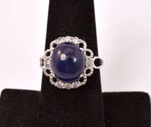 Captivating 8.65CTS Cabochon-Cut Star Sapphire & 0.39CTW Diamond Ring in Sterling Silver