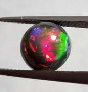 Full body flashing 3.28ct Welo Black Opal
