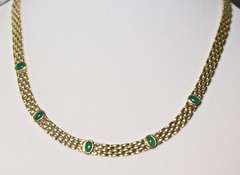 Stunning 18K Panther Link Necklace with Cabachon Emeralds