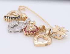Attractive Yellow Gold Safety Pin with 4 Charms