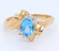 Fantastic Yellow Gold Blue Topaz and Diamond Ring
