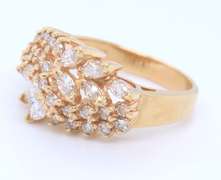 Handsome Marquoise and Round Cut Diamond Cluster Ring