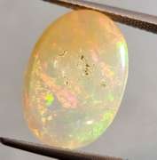 Full cover! 8.08ct rolling floral flashing Welo Opal