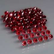 Incredible 7.02ct open color Pyrope Garnet set