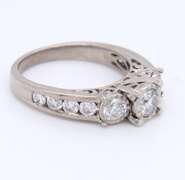 Stunning White Gold 1.25ctw 3 Diamond Ring w Channel Set Sides