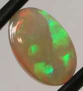 Full body flashing 1.86ct smoldering block and chaff Opal