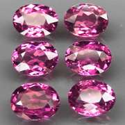 Remarkable 8.61ct violet pink Rhodolite Garnet set