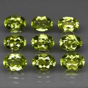 Dazzling 7.33ct untreated apple green Peridot set