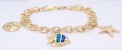 Incredible Yellow Gold Charm Bracelet with 3 Charms