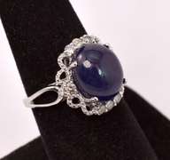 Captivating 8.65CTS Cabochon-Cut Star Sapphire & 0.39CTW Diamond Ring in Sterling Silver