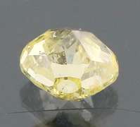 Glittering .36ct cushion cut yellow Diamond