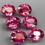 Ravishing 9.34ct violet pink Rhodolite Garnet set