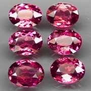 Ravishing 9.34ct violet pink Rhodolite Garnet set