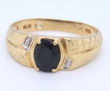 Attractive Yellow Gold Black Onyx and Diamond Ring