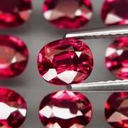 Amazing 6.86ct oval cut violet pink Rodolite Garnet set