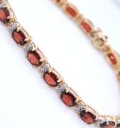 Wonderful Yellow Gold oval Garnet and Diamond Bracelet